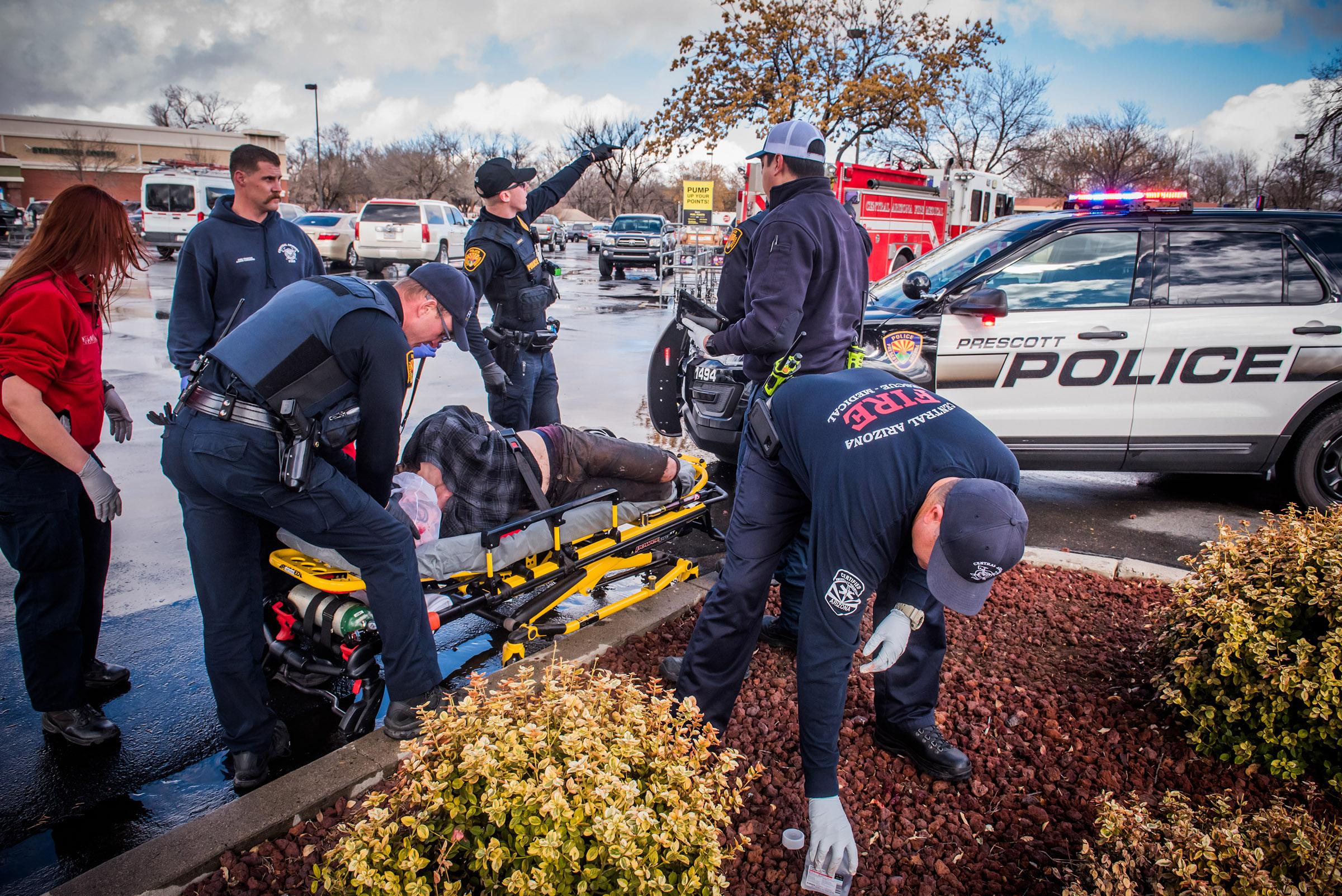 Prescott Police Helping Victim at scene